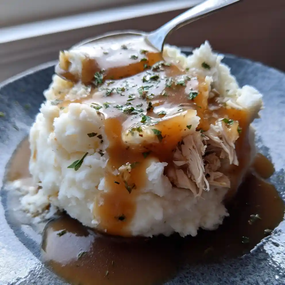 Creamy Rosemary Garlic Swirl Chicken Gravy Over Fluffy Mashed Potatoes 3 Creamy Rosemary Garlic Swirl Chicken Gravy Over Fluffy Mashed Potatoes 1767858322.7976635