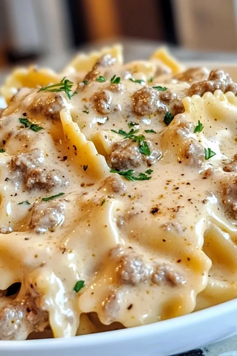Creamy Cajun Cream Cheese Alfredo Bowties with Spiced Beef 3 Recipe image