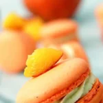 Peach Macarons with Peach Buttercream and Puree Center 4 Peach Macarons with Peach Buttercream and Puree Center