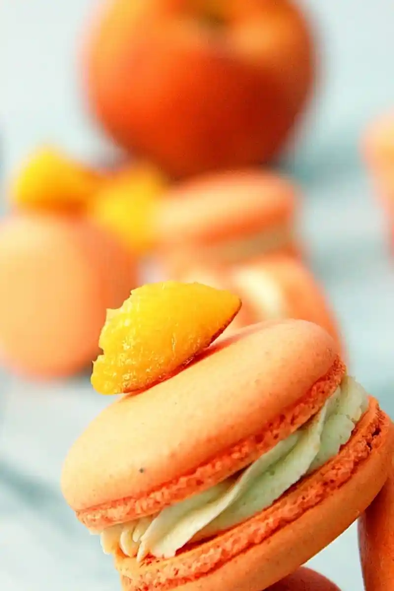 Peach Macarons with Peach Buttercream and Puree Center 3 Recipe image